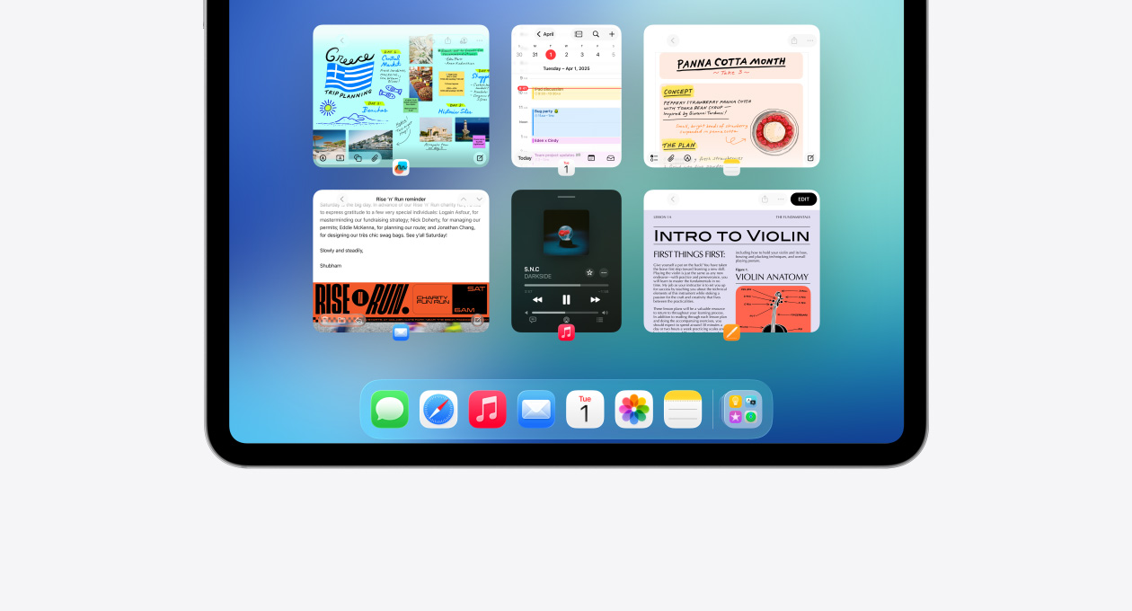 iPad, colocado na horizontal, a mostrar seis janelas abertas em duas filas, incluindo as apps Calendário, Notas, Apple Music e Safari