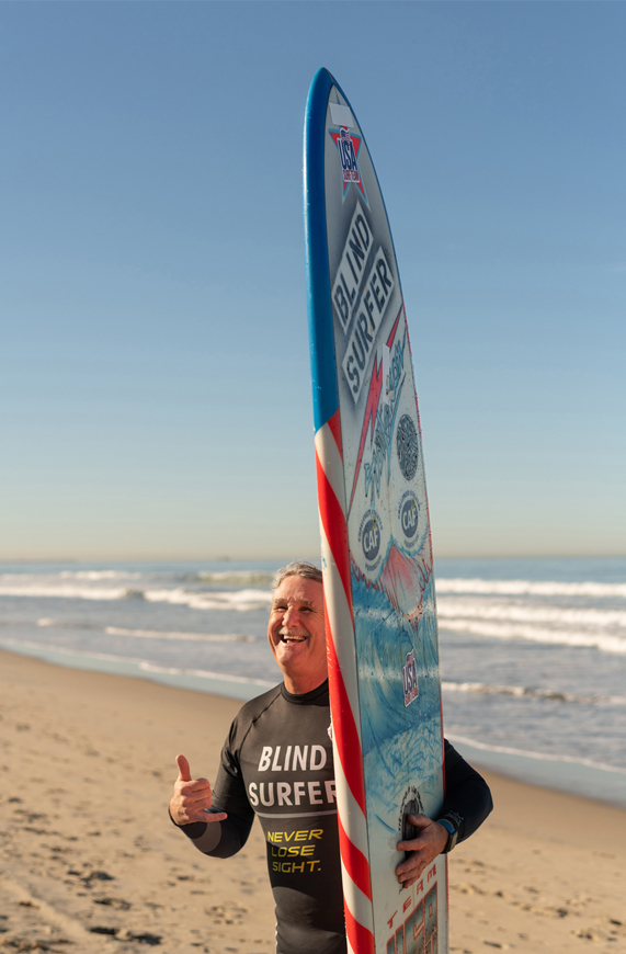 Scott Leason avec sa planche.