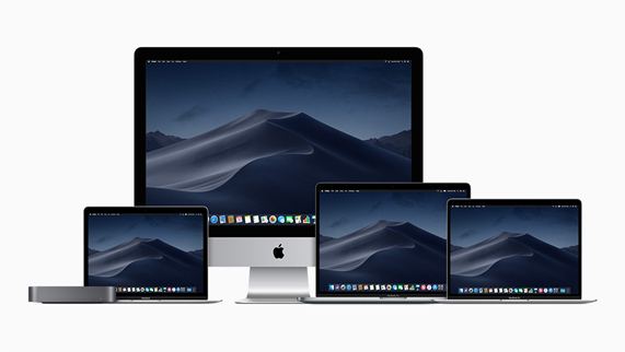 Mac notebooks in various sizes alongside the new space grey Mac mini and a Mac desktop.